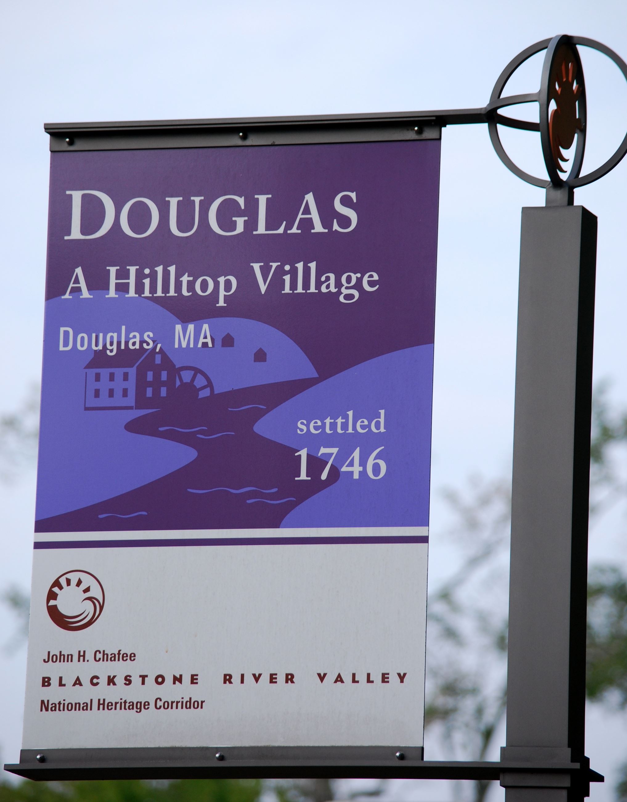 Street Flag on post, with text Douglas Hilltop Village  settled 1746